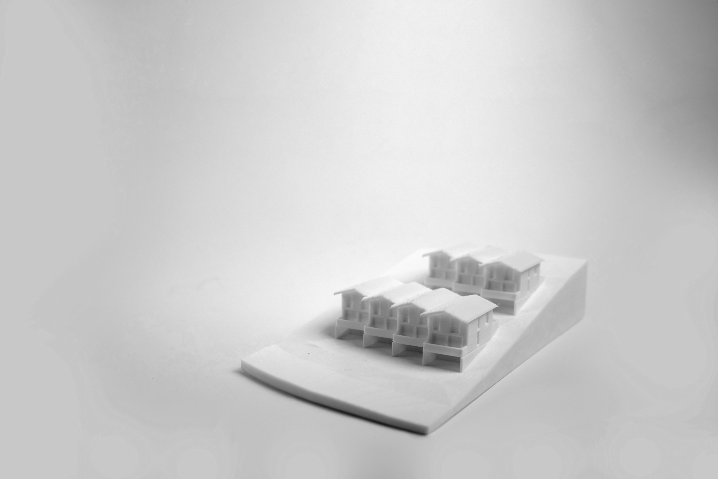 Vue en perspective d’une maquette de chalets contigus au 1:500
